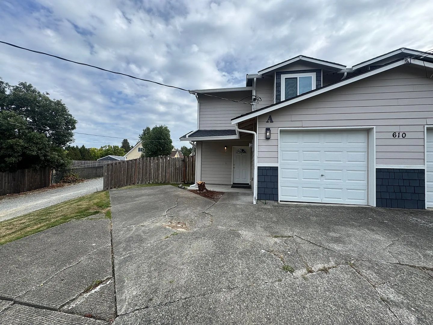 Three Bedroom with a Fully Fenced Backyard! — Photo 1