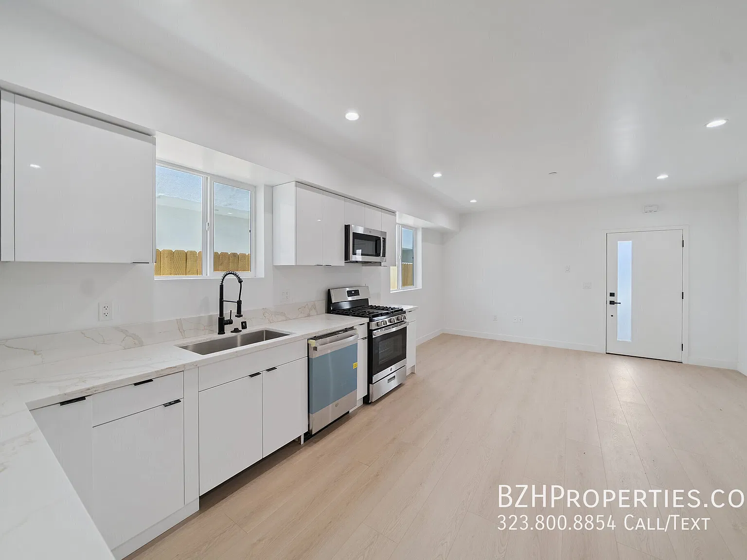 Bright 3BR with Designer Finishes & In-Unit Laundry — Photo 3