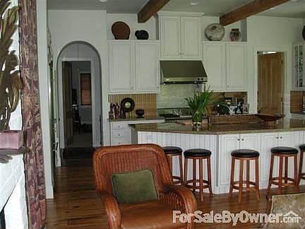 Kitchen and seating area near fireplace