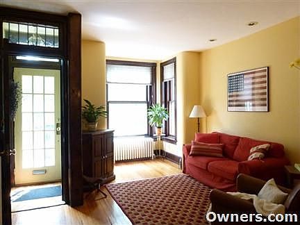 Sun filled living room and entryway