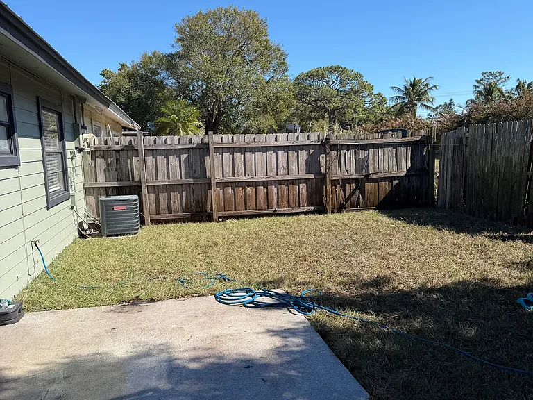 Private large fenced backyard
