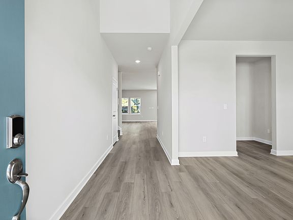The foyer opens up to a flex space or home office.