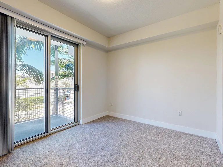 Spacious apartment Bedroom with Carpet Floor.