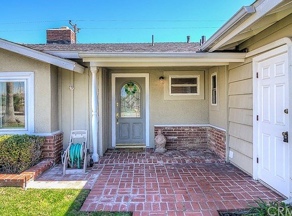 Old World entry and Dual access to Garage