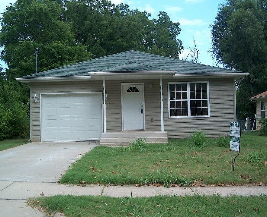 Front View of House with Attached Garage