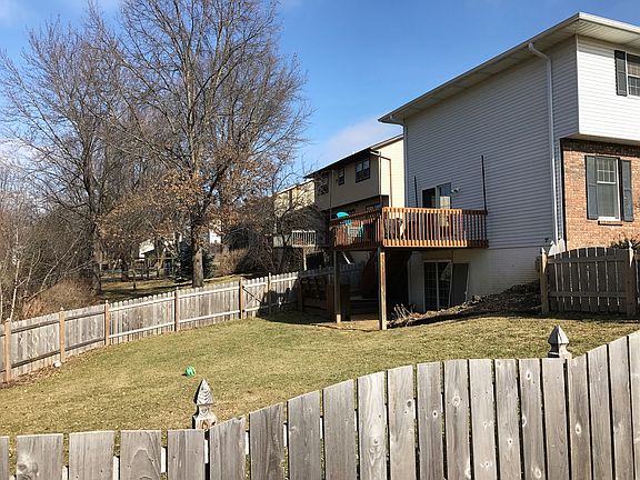 Fully fenced yard with deck