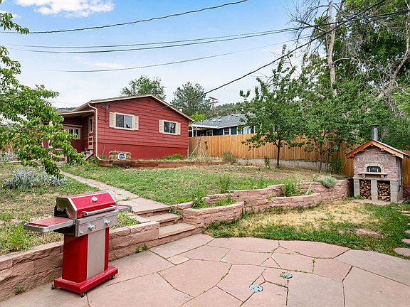 Flagstone patio and custom pizza oven.