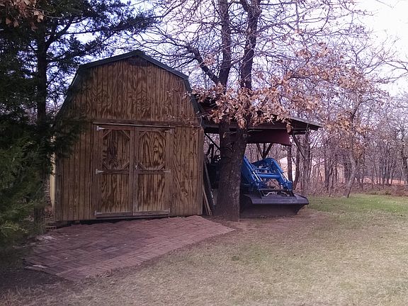 Shed with covered area