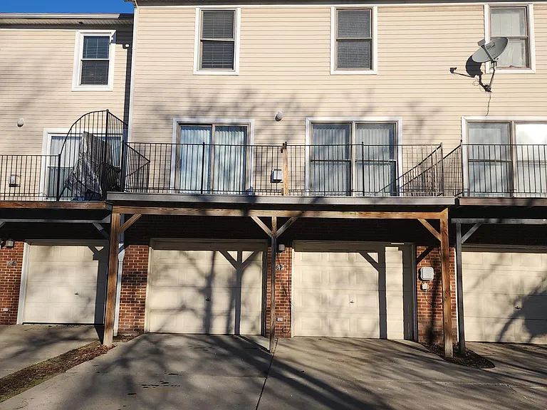 Balcony and 2 car garage