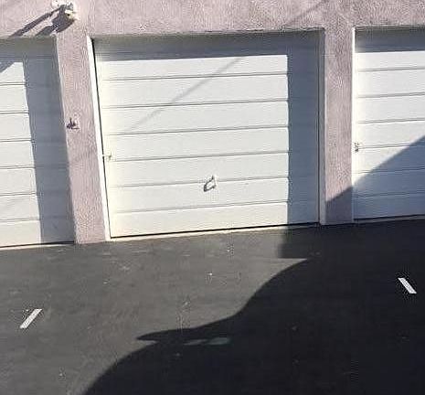 Private, enclosed garage (for parking/storage only, NO appliances, NO workshop of any kind)