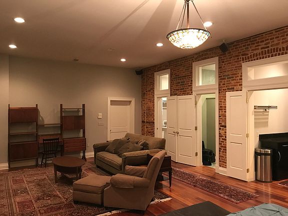 Doors to laundry bathroom and kitchenette