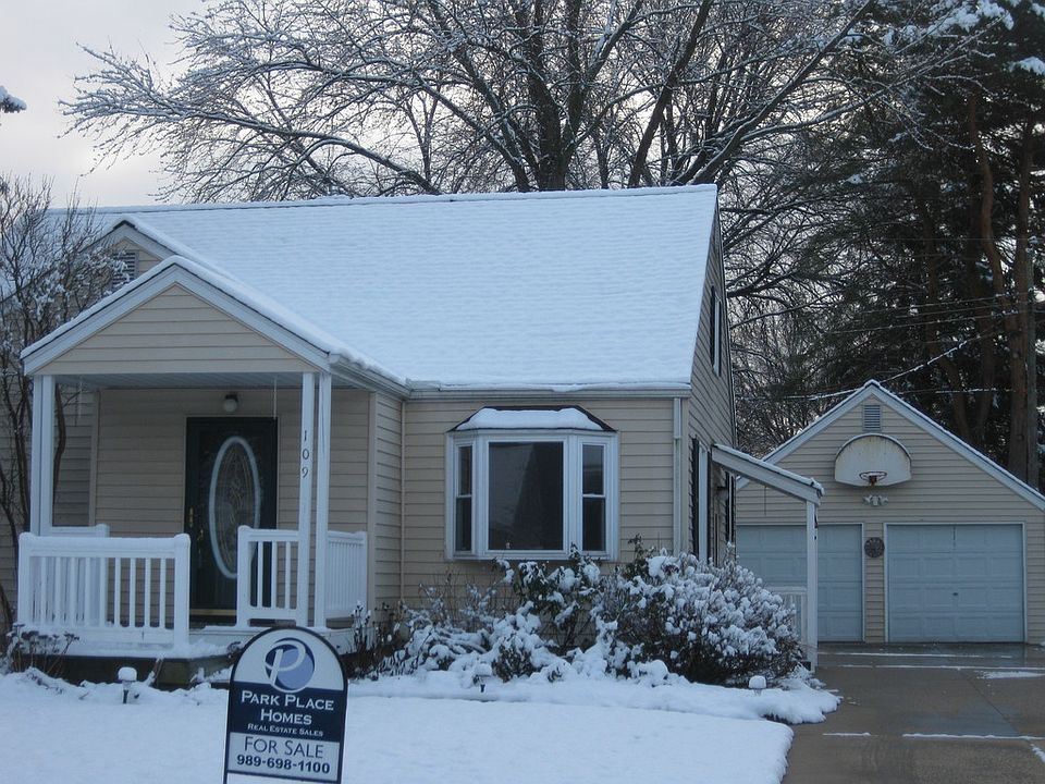 Sweetly updated home on a quiet court. Peaceful and safe for the kids with a large fenced back yard. The home is larger than it appears. 3 bedrooms with the main floor den as a possible 4th Bedroom,  main floor master has a doorway to a private patio, two baths, one remodeled with jet tub.  Nicely manicured fenced yard that gives you privacy. Carpet just installed in the living room and dining room.  Newer windows throughout  including a bay window wall, newer exterior doors and maintenance free siding too. The roof singles were replaced in '04.  The basement is partly finished for extra space. High efficient home with new furnace and extra insulation for low utilities. This home even has an updated electrical box and water heater. Perennial gardens and a path to a gate into a park in this gorgeous back yard.  There are 2 patios, one off the master bedroom. The two car garage is ideal as well.  Ready for you to move right into this Centrally located home close to shopping and schools.
