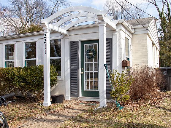 Front door and enclosed porch