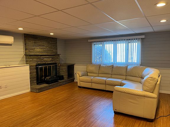 Large family room/bedroom space. Sofa is not in space