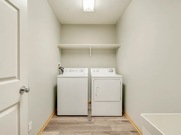Homes include spacious laundry rooms with full-size washers and dryers.