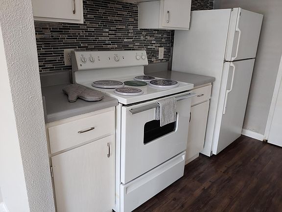 New multicolored glass black splash; new stainless steel appliances not shown for unit D