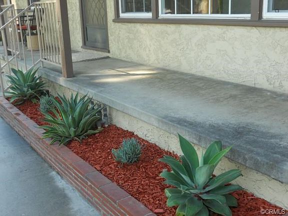 New drought resistant mature plants & long porch for relaxing ev