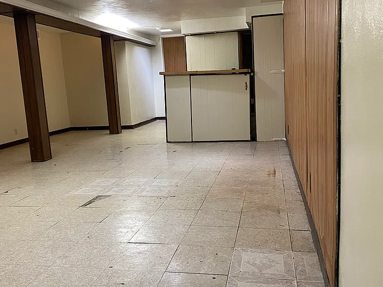 Entrance to the finished basement - Additional family space with a bar