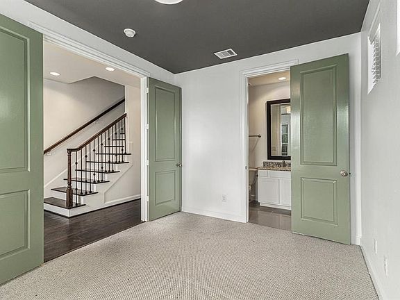 Discover the convenience of a ground-floor bedroom or office with an attached private bathroom, located immediately to your right upon entering the home.