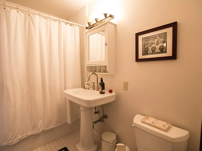 Full Bath One - Powder next to Playroom