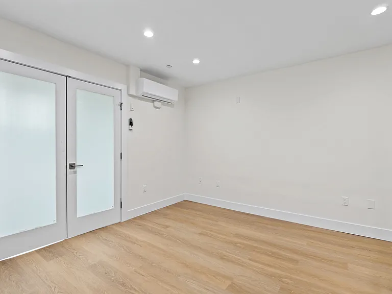 Dining or Living Room Space with Recessed Lighting and Vinyl Flooring