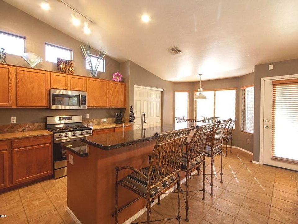 1st image of 8825 N Acacia Grove Pl