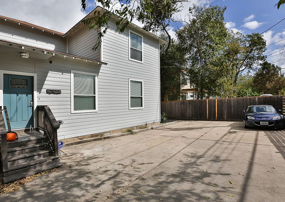 Driveway with room for 1-2 cars + easy street parking.