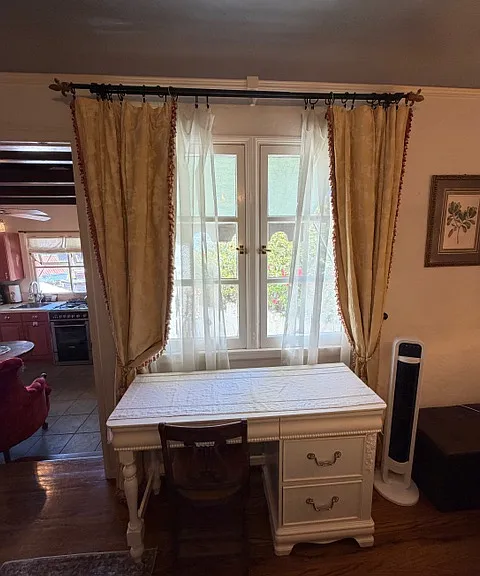 Writing Desk in Bedroom with Door and Stairs down to Kitchen & Dining
