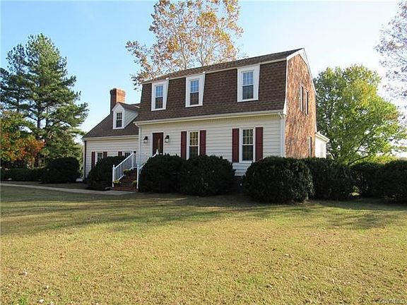 Brick and vinyl siding with dimensional roof and replacement windows