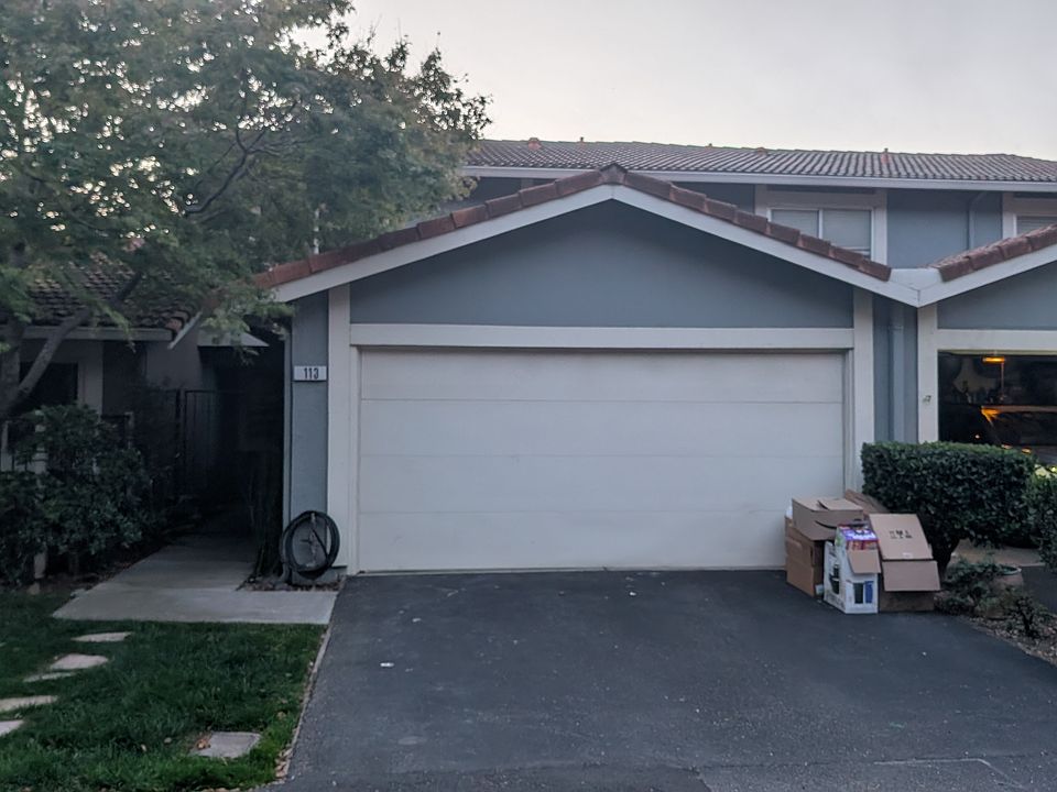 2 car garage with additional driveway parking
