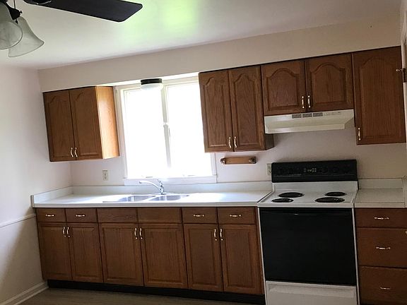Oak cabinets, new laminate floor.