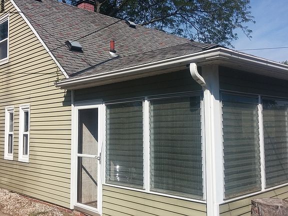 Rear Corner and Sunroom