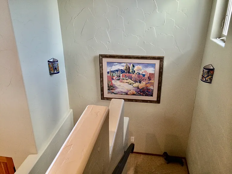 Stairway from upstairs landing.