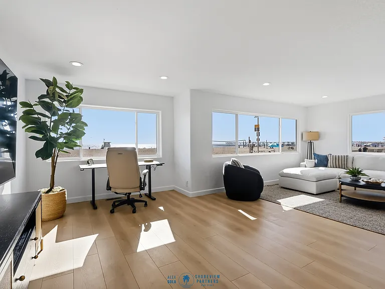 First level offers working and lounge area with full bathroom and bar.