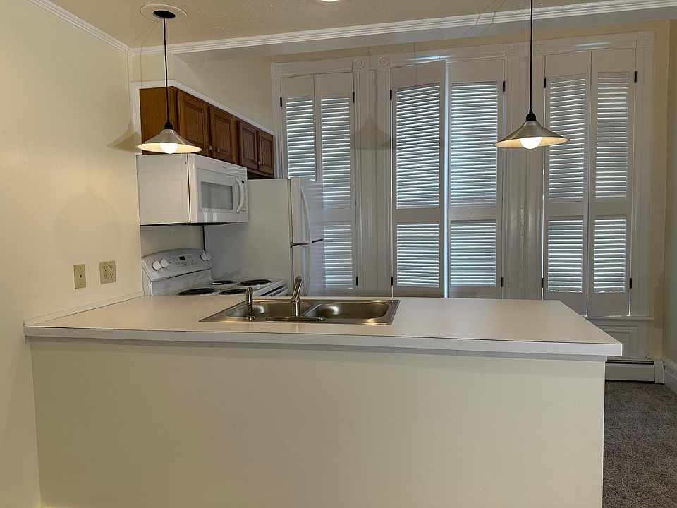 The interior shutters continue into the kitchen, which has a huge pantry for storage.