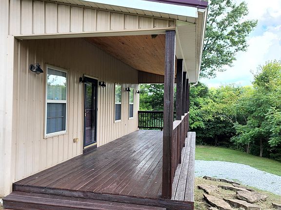 Newly stained, covered, front porch