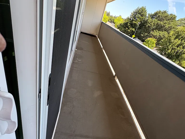 Balcony facing Center Blvd.,