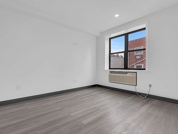 4th image of 3417 103rd St APT 203