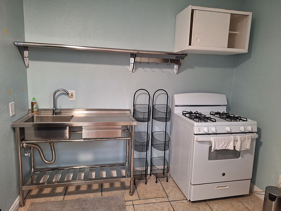 Kitchennette. There is a small fridge outside of view and the kitchen has a wall cabinet outside of view for canned or box goods.