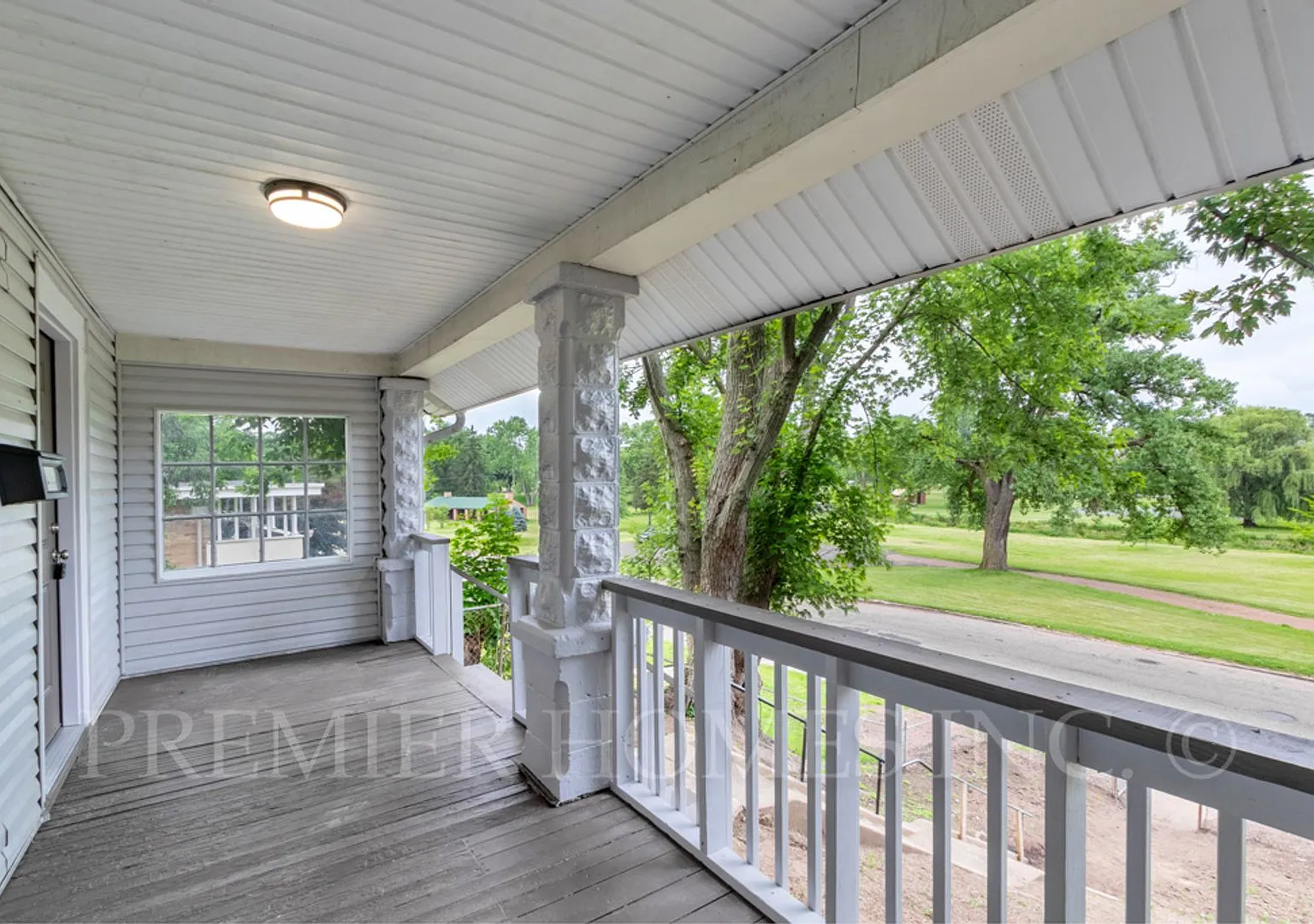 Park-Front Renovated 3BR/1BA with Huge Porch & 3-Car Garage! -415 Elgin Ave NW — Photo 2