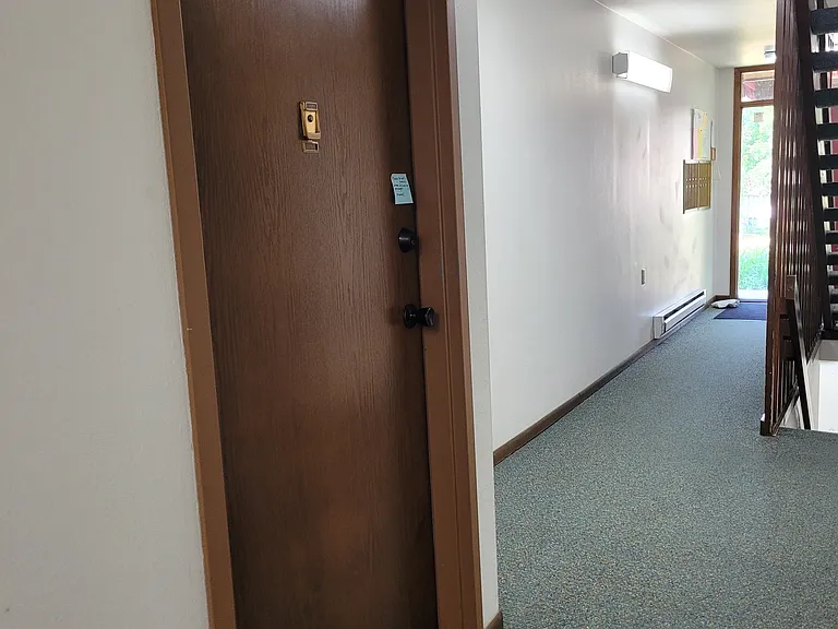 An elegant, fire-retardant entry door (a $1700 safety feature).