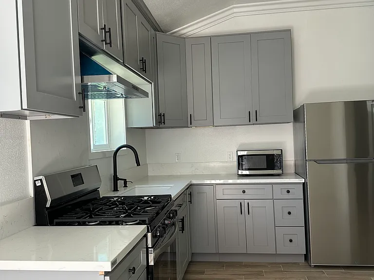 2556 E 220th St #1/2 — Photo 5