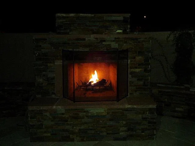 Outdoor wood burning fireplace
