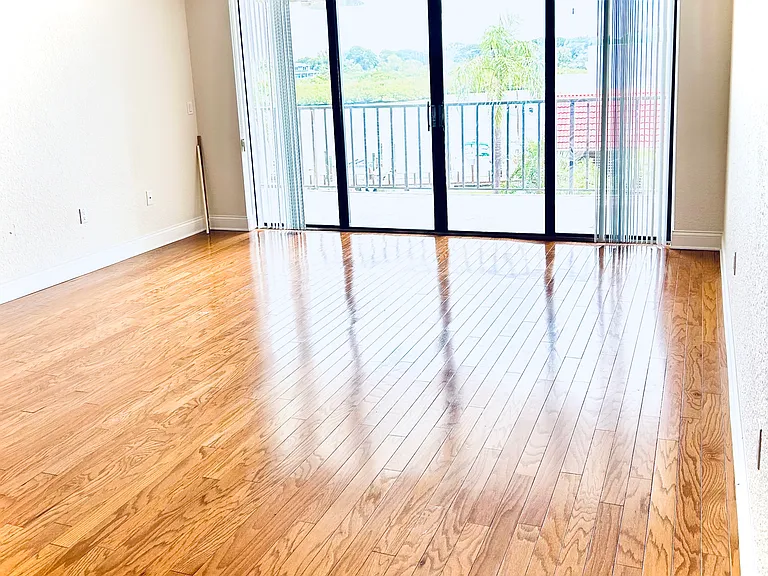 Family room opens to wall to wall sliding glass doors
