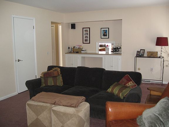 Family room with 2 new french doors leading to backyard and 4 season room