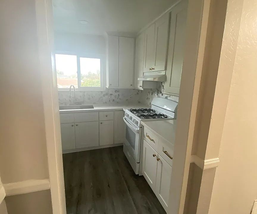 View of Stove/Kitchen Space from Living Space/Hallway