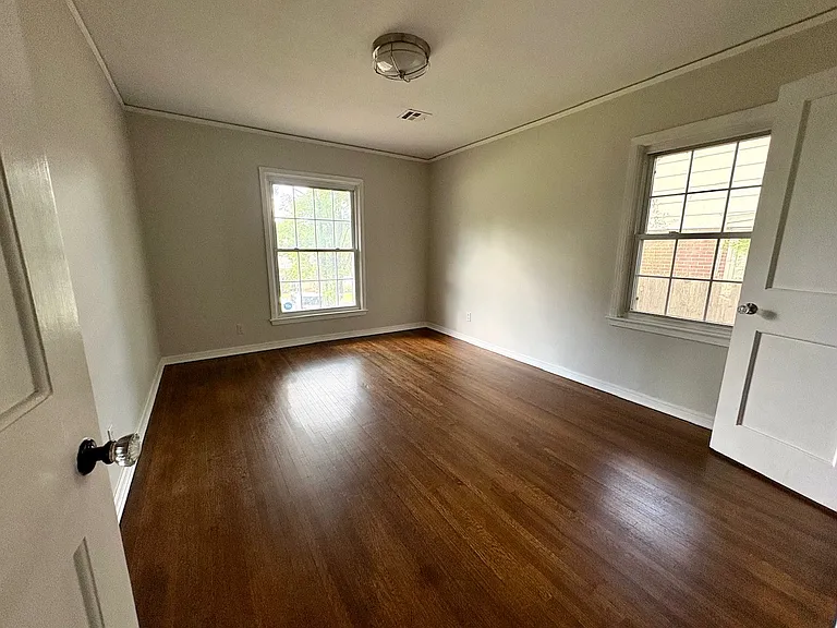 Guest bedroom with closet.