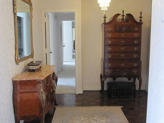 Formal entry with wood floor