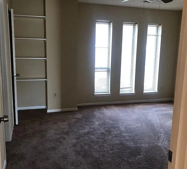 Bedroom with bathroom and large closet, new carpet
