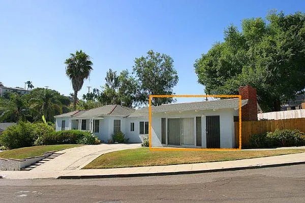 Front lawn and corner unit exterior, lots of street parking